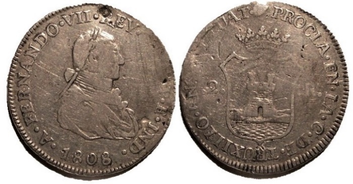 Imagen que contiene objeto, moneda, erizo de mar, equinodermo

Descripcin generada automticamente