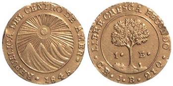 Moneda de color plateado

Descripci&oacute;n generada autom&aacute;ticamente con confianza media